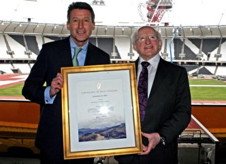 President Michael D Higgins presents Sebastian Coe with his Certificate of Irish Heritage