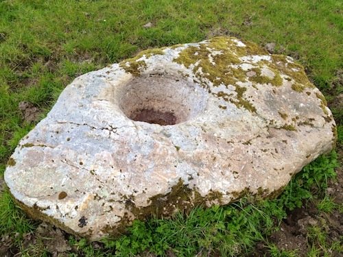 Bullaun stone on Holy Island, Lough Derg, County Clare