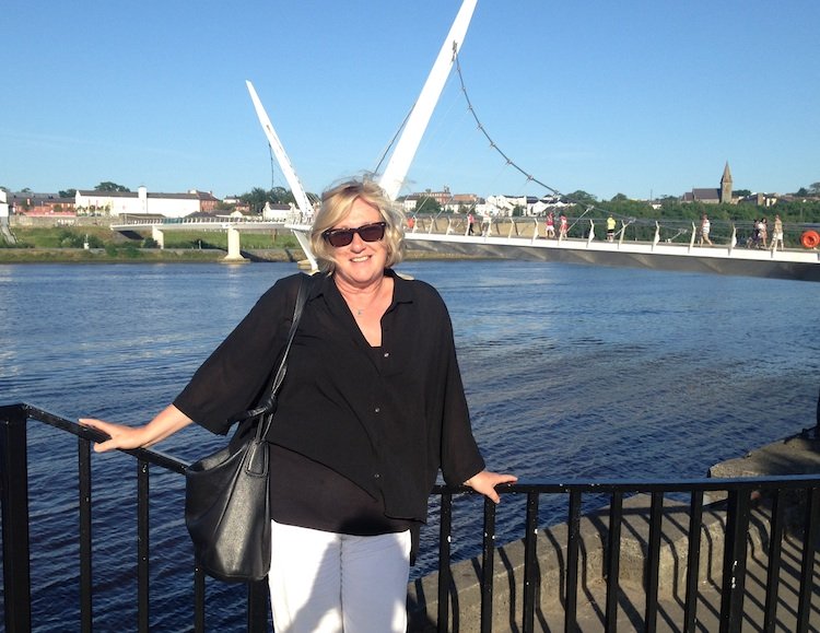 Susan Byron, with the Peace Bridge in Derry in the background.